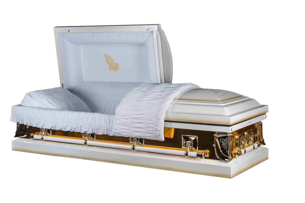 white and gold casket